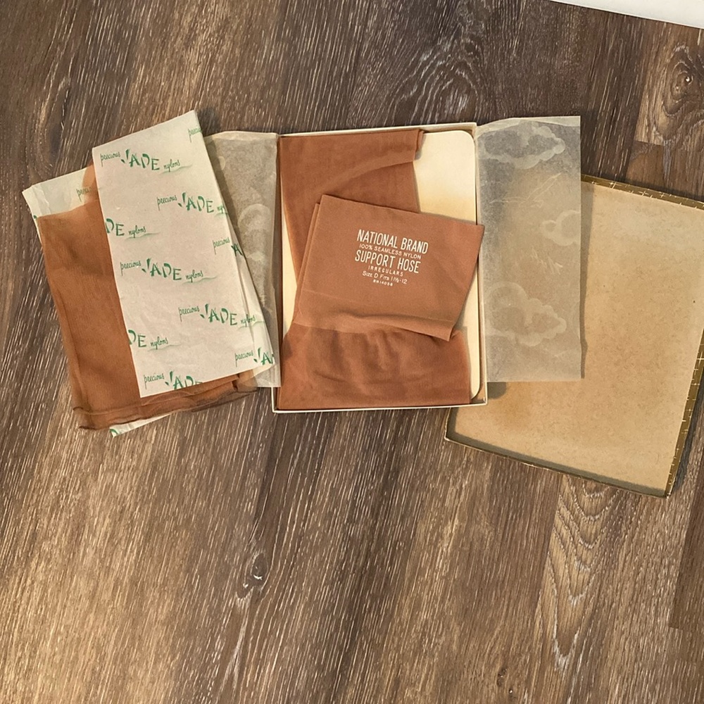 2 pair vintage stockings with original tissues and box.